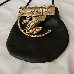 Copa Collection's vintage one of a kind crossbody black and brass handbag.